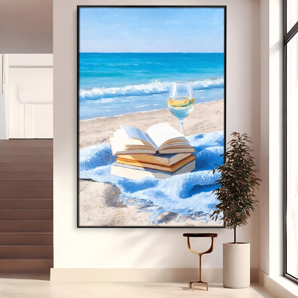 Tablou canvas cu pictura cu carti si pahar de vin pe plaja, in rama de aluminiu negru